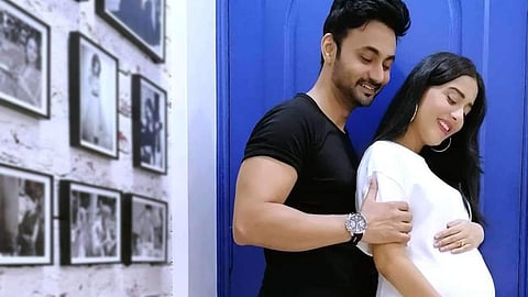 Amrita Rao with RJ Anmol