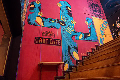 Graffiti wall at the entrance of Art Cafe