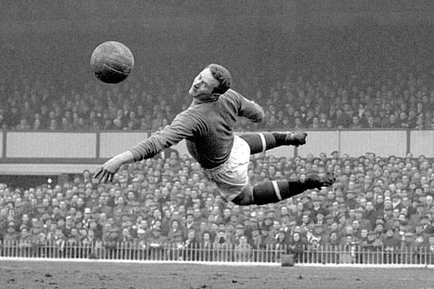 March 22, 1958 file photo: Manchester United goalkeeper Harry Gregg (PA via AP)