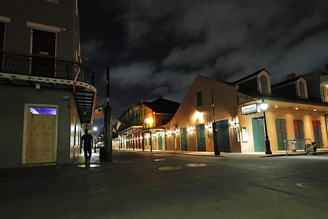 A nearly deserted Bourbon Street (AP Photo/Gerald Herbert, File)