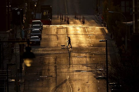 An empty downtown street in Kansas City (AP Photo/Charlie Riedel)