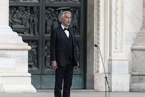 Andrea Bocelli sings in a deserted Piazza del Duomo in Milan (AFP/Piero Cruciatti)