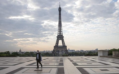 At the Eiffel Tower, Paris (AP Photo/Michel Euler, FILE)