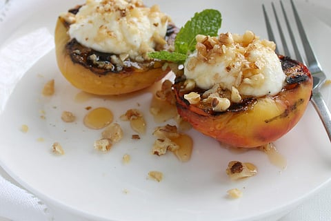 Recipe: These grilled peaches make for a quick and easy dessert