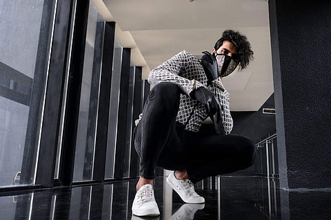 Jacket with in-built masks and gloves by Abhishek Dutta