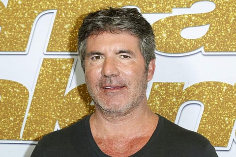 Simon Cowell (Photo by Willy Sanjuan/Invision/AP, File)