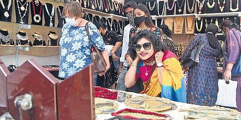 Customers at a shop in Delhi