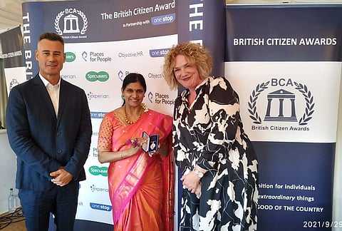 Ragasudha Vinjamuri receiving the award