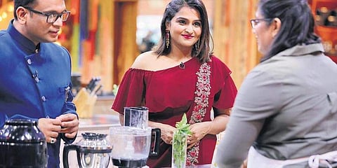 Judge Harish Rao and actress Ramya Nambeesan with a contestant.