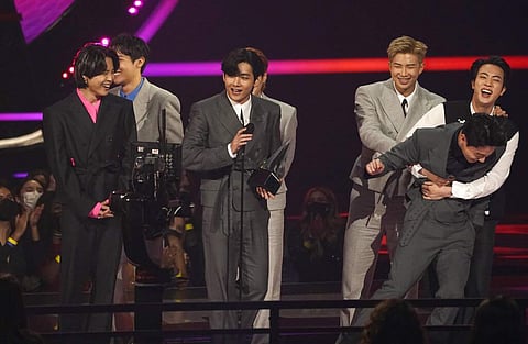 BTS accepts the award for artist of the year at the American Music Awards. (AP Photo)