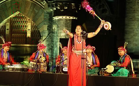 A baul singer performing at an event
