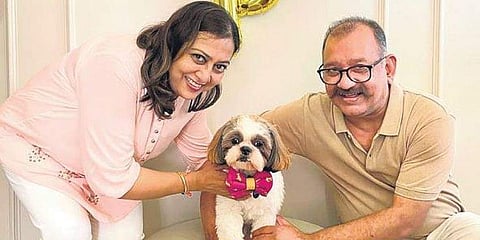 A gleeful dog owners