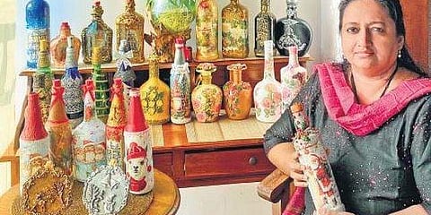 Bessy George’s art puts waste bottles to prettier, better use