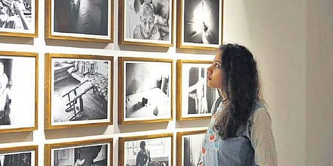 A viewer at the Indian Photo Festival that concluded last week