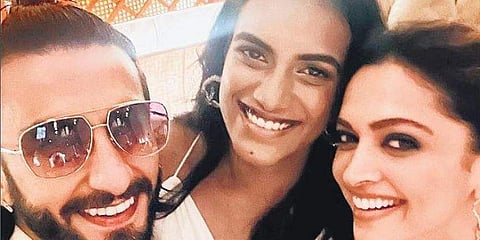 Olympic medallist PV Sindhu with Hindi film actors Deepika Padukone and Rnaveer Singh