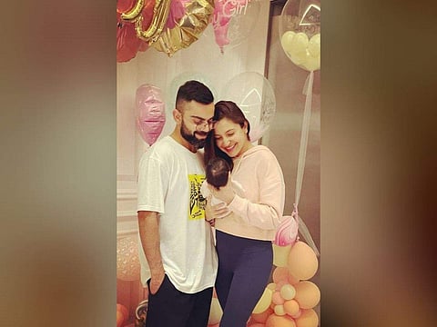 Anushka Sharma and Virat Kohli with their daughter Vamika