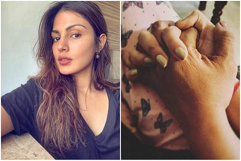 Rhea Chakraborty posted a picture on Instagram where she is seen holding her mother's hand.