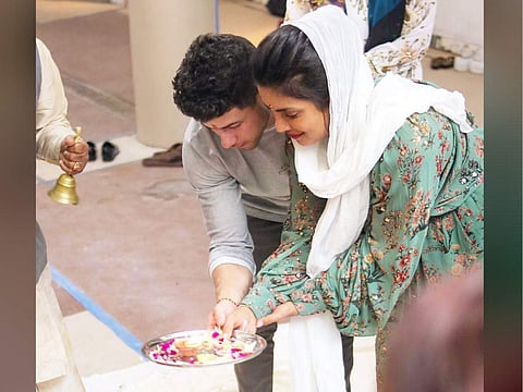 Priyanka Chopra Jonas and Nick Jonas doing a puja for her restaurant Sona that will be opened soon