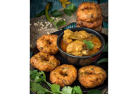 Garelu served with Kodi Pulusu