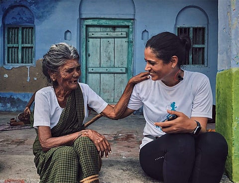 Srishti Bakshi (right) in a still from the documentaryW.O.M.B.