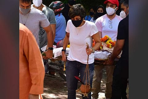 Mandira Bedi performs the last rites for her husband Raj Kaushal