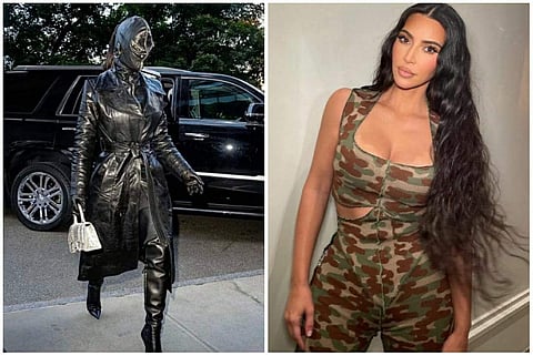 Kim Kardashian left fans puzzled when she landed in the city wearing a leather suit that covered her entire body, including face