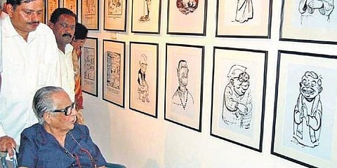 RK Laxman at the Indian Institute of Cartoonists in 2002