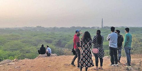 Caleb Call and his team leading a guided tour of Sanjay Van.