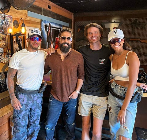 Yash with Lewis Hamilton and Ella Balinska| Image credit: Instagram @ryan_pettijohn