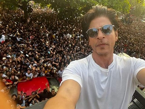 Shah Rukh Khan with his fans at his residence in Mumbai