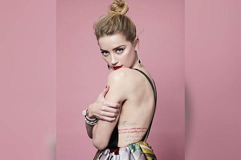 Amber Heard has taken a step back from the spotlight after losing her highly-publicised court battle against Johnny Depp