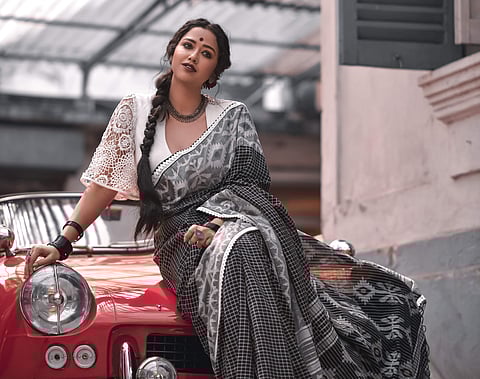 Sohini Sarkar brings back the yesteryear vibe with Anushree Malhotra's monochrome sari and flared sleeves