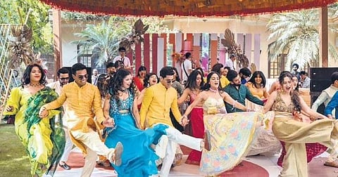 Utsav Malhotra and Kamna Arora with their wedding crew