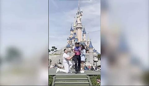 Screenshot from the video of a man proposing at Disneyland