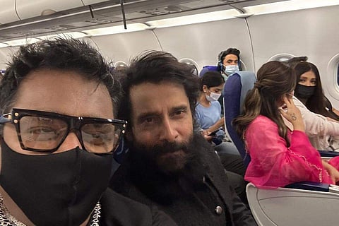 AR Rahman with actors Aishwarya Rai Bachchan, Vikram and Trisha in the flight