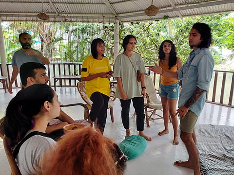 Aditya Ashok speaking to artistes at the AMI residency