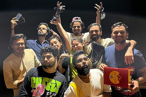 Cast members of the play