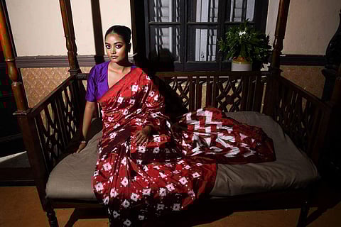 A maroon telia pattern ikat silk