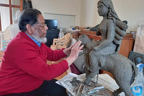 Sakti Burman in his studio