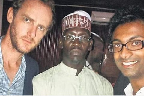 Anjan, Lewis Mudge and General Kalil, who was fleeing the war in 2013.