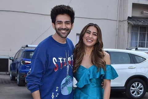 Kartik Aaryan (L), Sara Ali Khan (R)