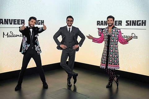 Ranveer Singh poses with his wax statues at Madame Tussauds