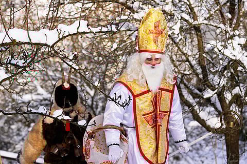 In frame: Revelers take part in a traditional St. Nicholas procession in the village of Lidecko, Czech Republic