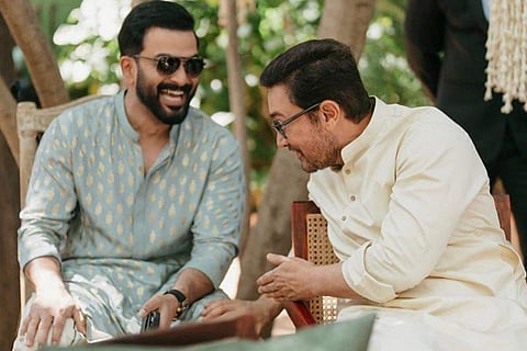 In the snap, Prithviraj and Aamir looked dapper as they smiled while chatting about something