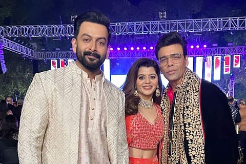 Prithviraj Sukumaran and Supriya with Karan Johar