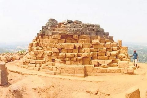 Rock-cut caves; view of the stupa