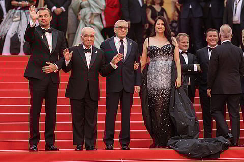 Leonardo DiCaprio, from left, director Martin Scorsese, Robert De Niro, and Cara Jade Myers pose for photographers upon arrival