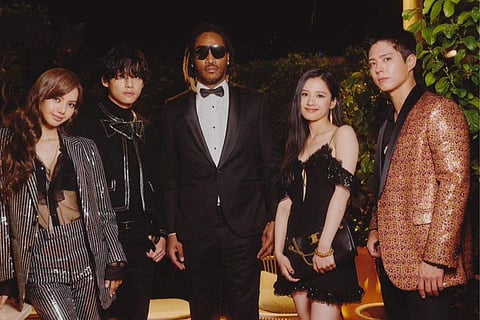 V with other guests at birthday party in Cannes
