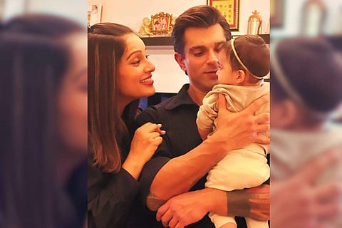 Bipasha Basu and actor Karan Singh Grover with their daughter