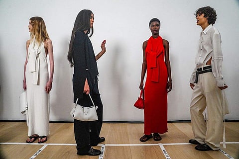 Fashion from Proenza Schouler collection is modeled backstage pre-show, during Fashion Week,
